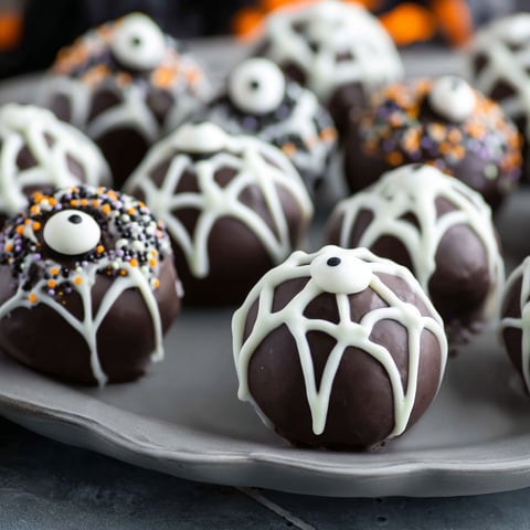 Halloween Oreo Balls on a plate.